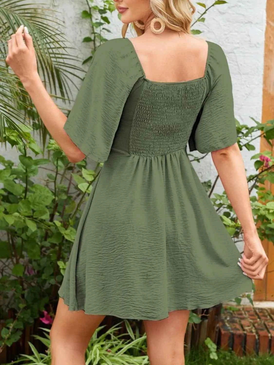 Smocked Flutter Sleeve Dress with Knotted Back and Elegant Flutter Sleeves