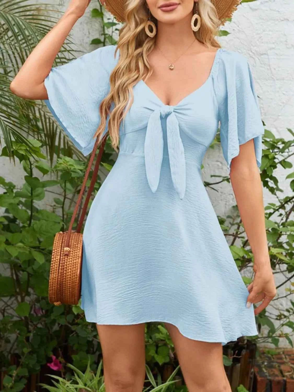 Smocked Flutter Sleeve Dress with Knotted Back and Elegant Flutter Sleeves