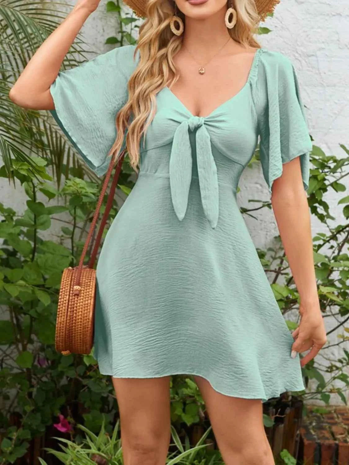 Smocked Flutter Sleeve Dress with Knotted Back and Elegant Flutter Sleeves