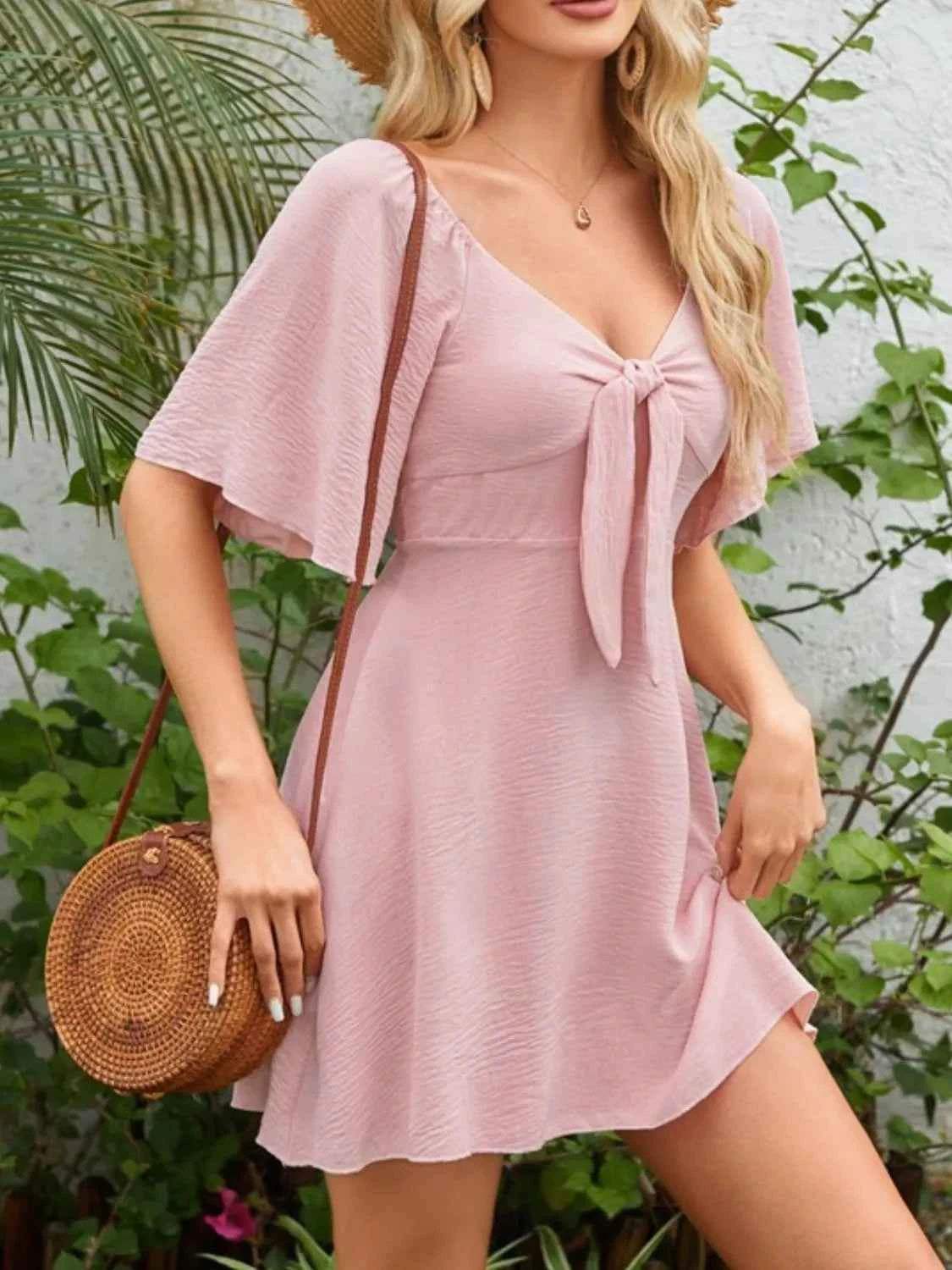 Smocked Flutter Sleeve Dress with Knotted Back and Elegant Flutter Sleeves