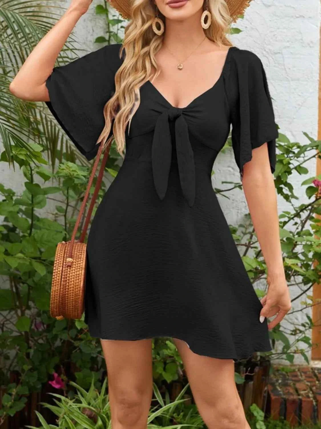 Smocked Flutter Sleeve Dress with Knotted Back and Elegant Flutter Sleeves