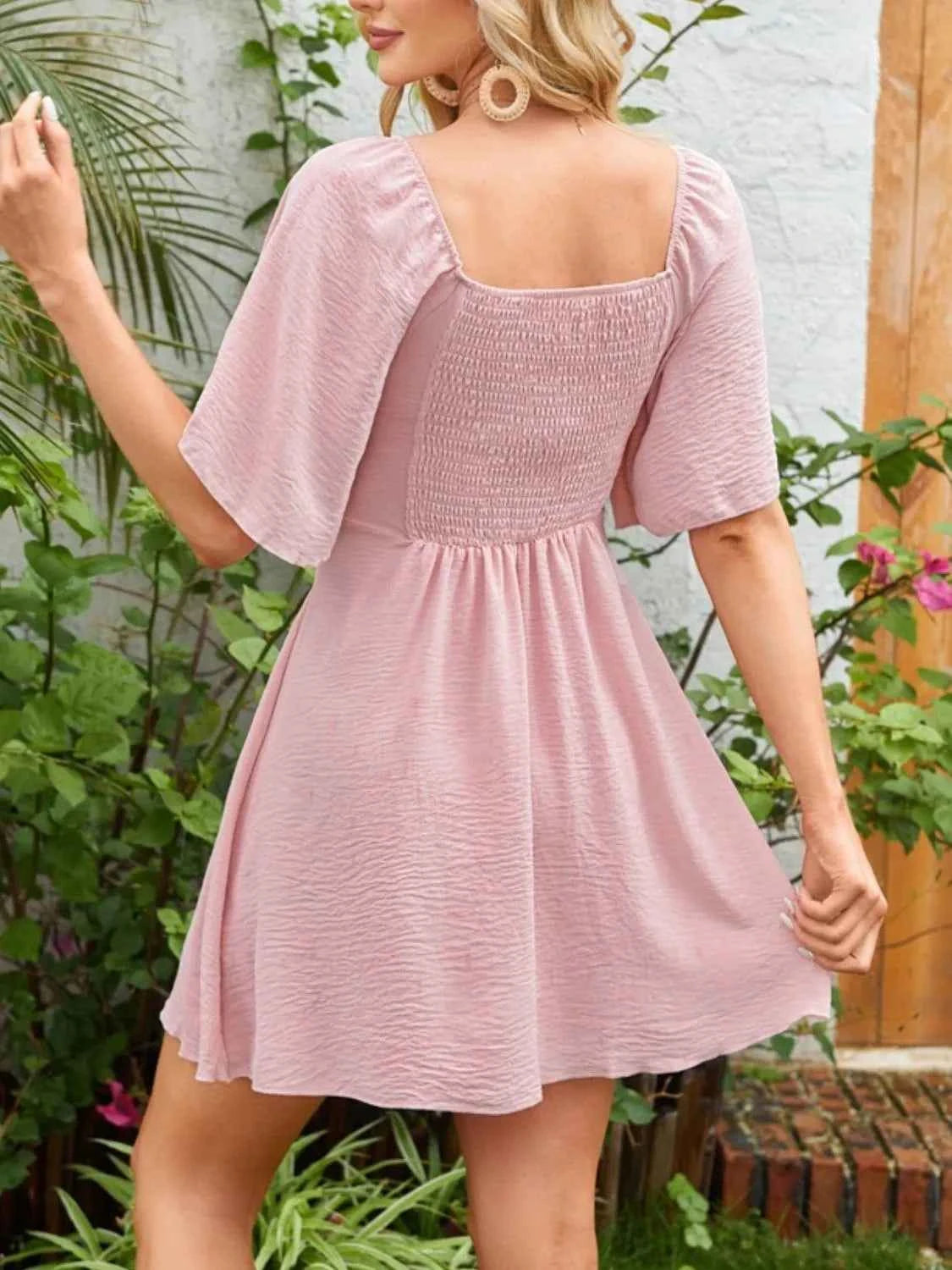 Smocked Flutter Sleeve Dress with Knotted Back and Elegant Flutter Sleeves
